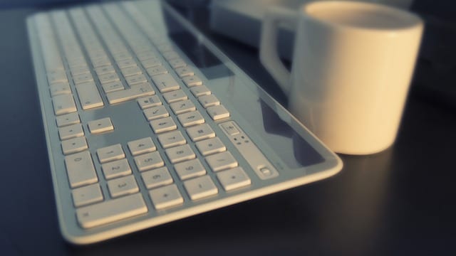 Keyboard and coffee